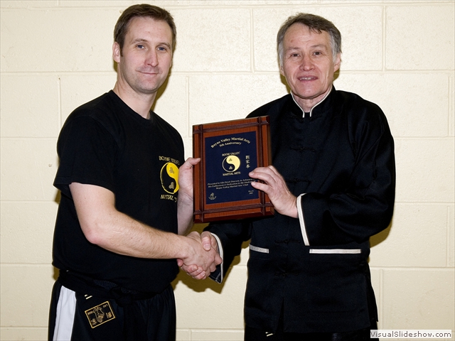 On the closing day of the John Russell Course, John, on behalf of the students, very kindly presented Derek with a small plaque commemorating the 5th birthday of the clubs.